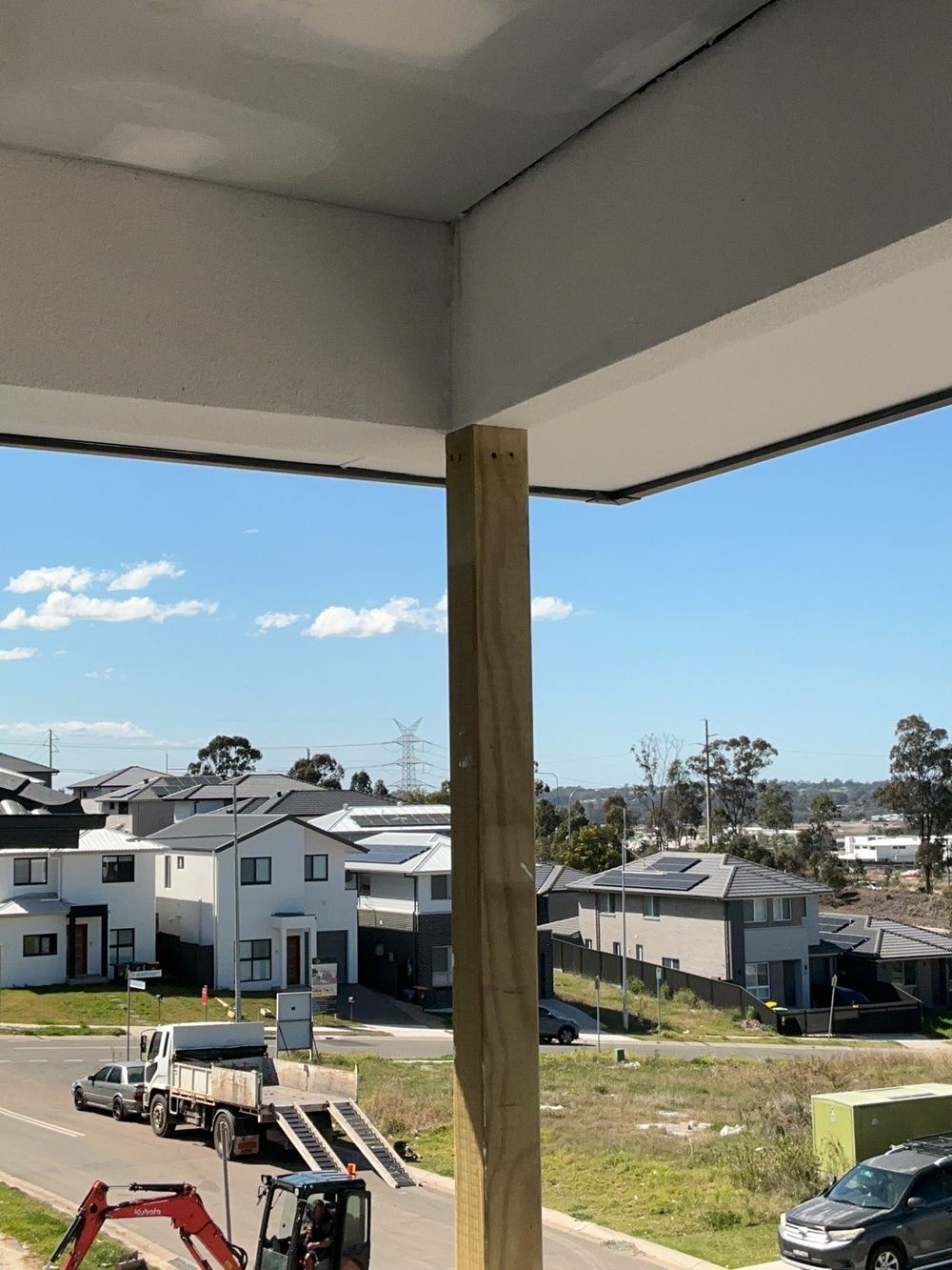 Balcony posts incomplete and needing an engineer's certification, found during a fixing stage inspection in Cobbitty