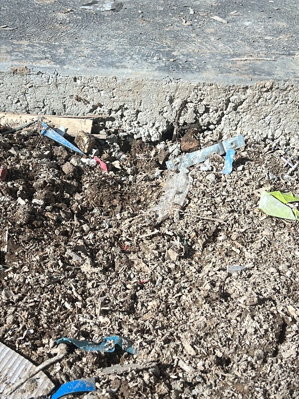 Honeycombing in the new driveway concrete, found during a handover inspection in Cobbitty
