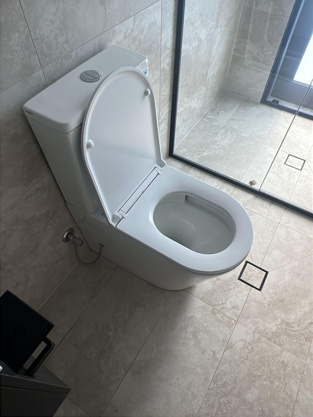 Toilet pan loose and not secured to the floor, found during a handover inspection in Cobbitty