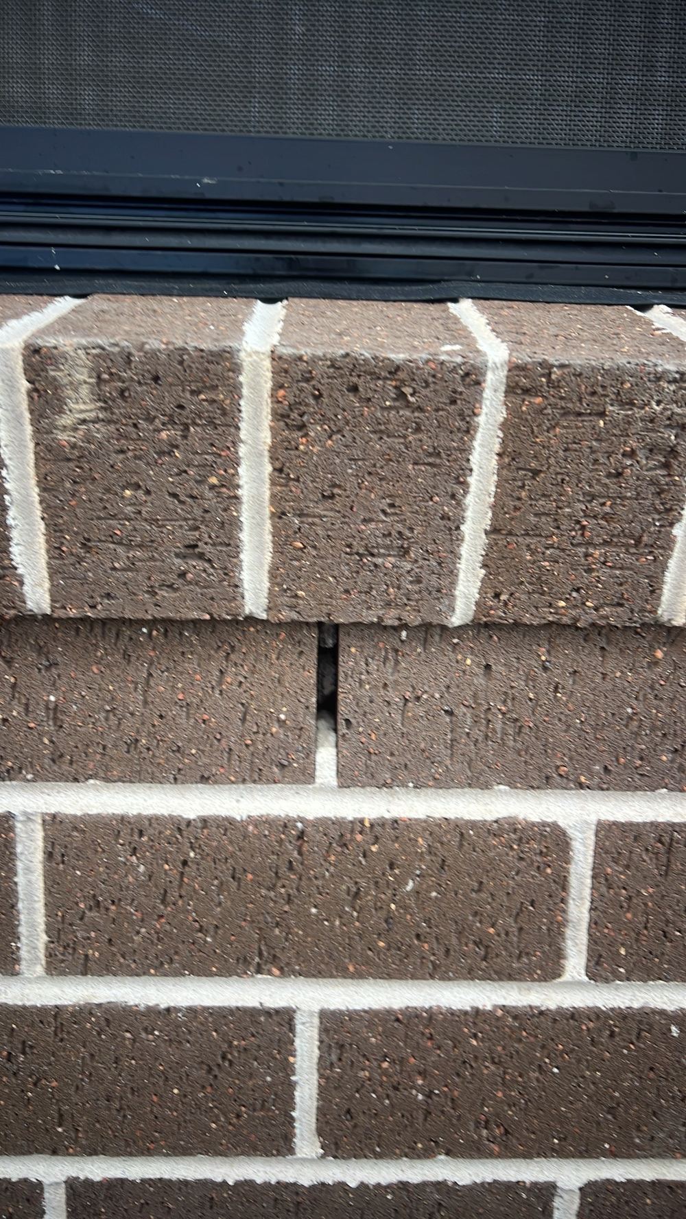 Weep holes blocked with mortar and render, found during a handover inspection in Cobbitty